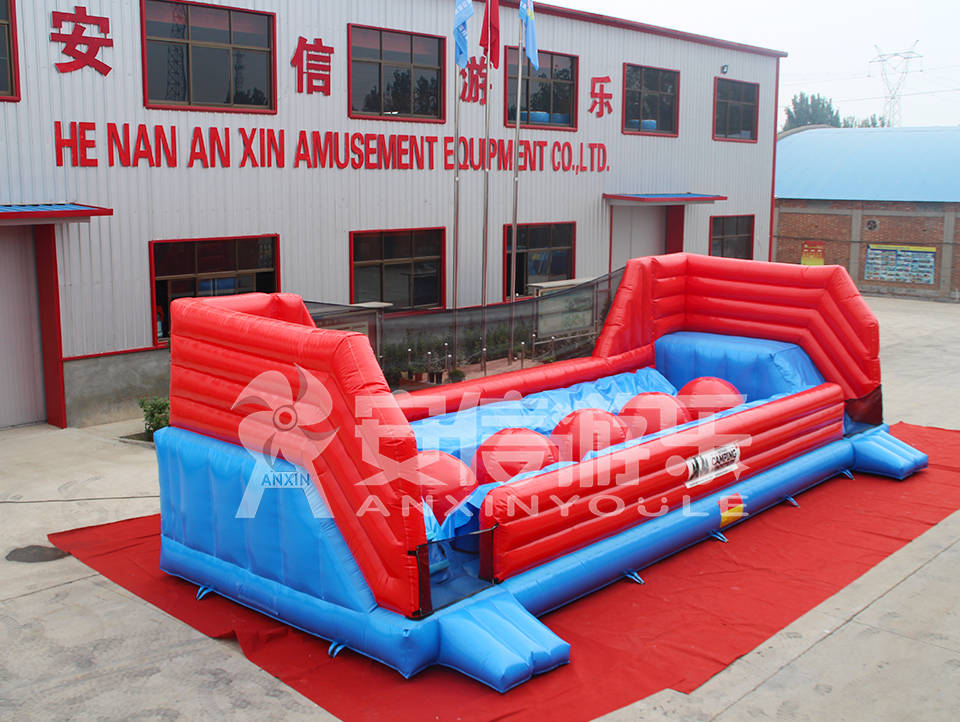 inflatable wipeout ball game