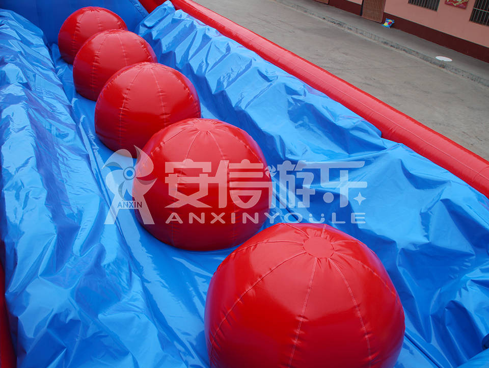 inflatable wipeout ball game